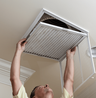 Changing air filters in ceiling