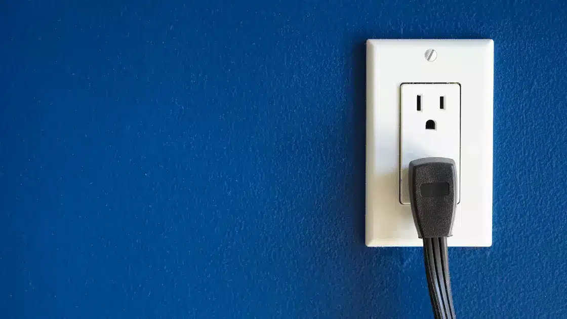 GFCI Electrical Outlet with an appliance plugged in